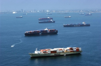 photo of container ships in ocean