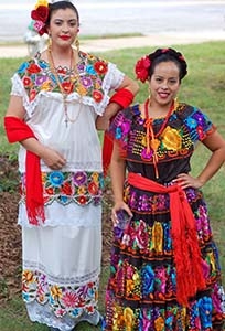 dancers in traditional Aztec costume