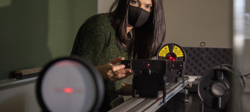 photo of woman with laser