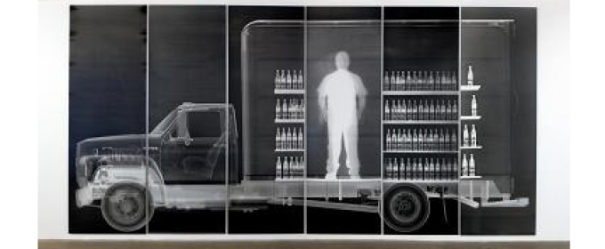 x-ray of man inside truck