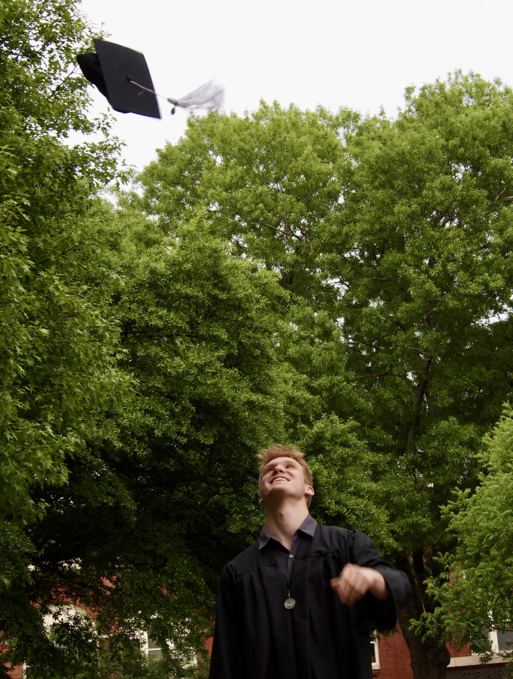 Gavin throwing cap