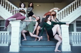 dance students on stairs of Holmes-Hunter academic building