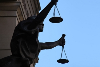 photo of statue representing blind justice