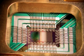 photo of computer chip and holder