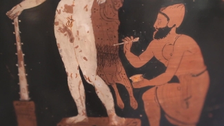 photo of a painting on an ancient vase