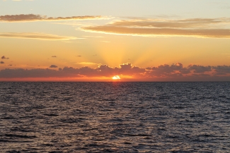 photo of sunrise over ocean