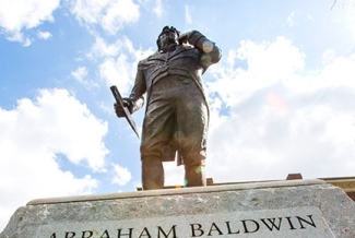 Baldwin statue from below