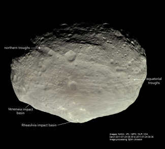 photo of asteroid in space, with labeling text