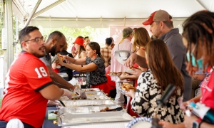photo of people and food table