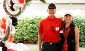 photo of two people with props