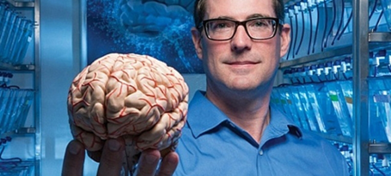 man holding brain