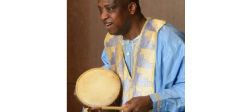 man with hand drum