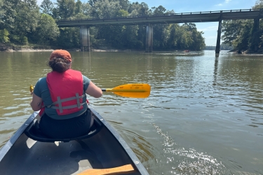 photo of kayaker on river