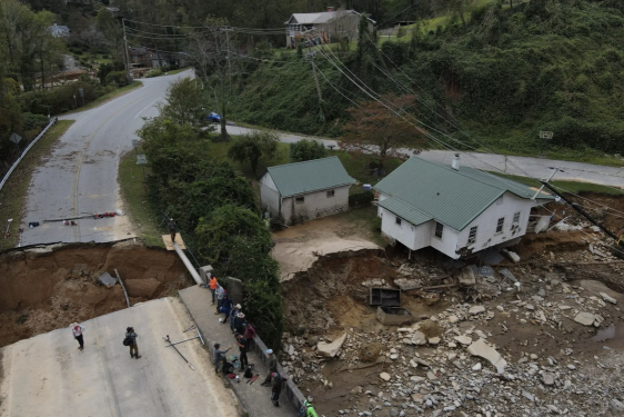 aerial photo of storm damage, road collapse