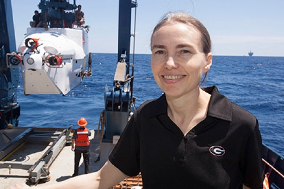 woman at sea on research vessel