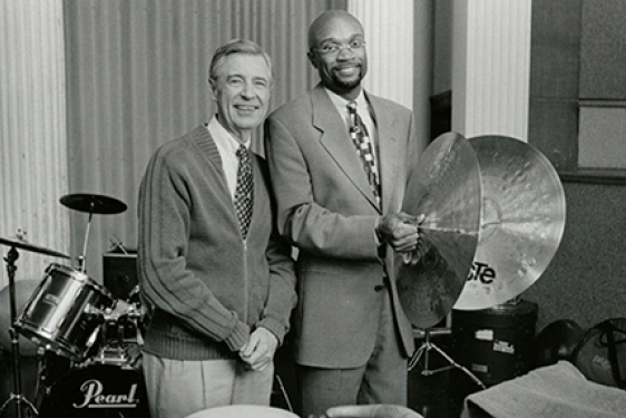 black and white photo of two men with percussion instruments