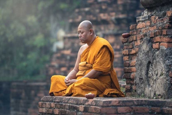 photo of a monk in meditation