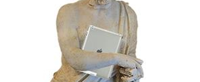 statue with iPad