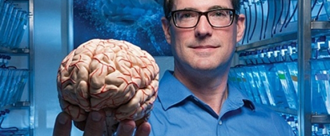 man holding brain
