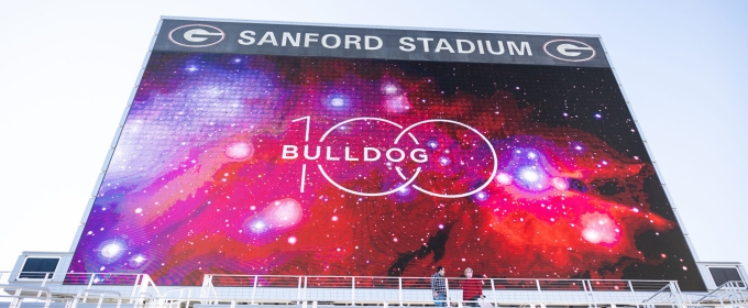 photo of stadium Jumbotron with Bulldog 100 graphic