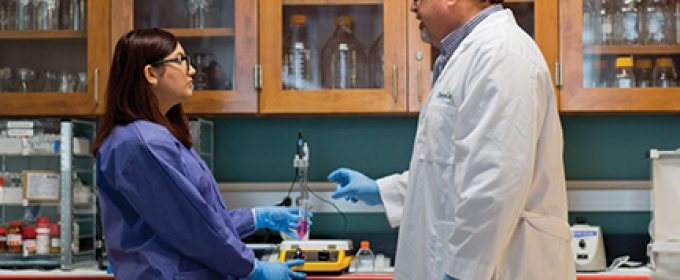 photo of two people in a lab