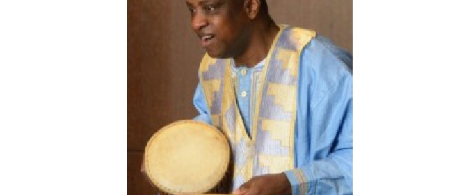 man with hand drum