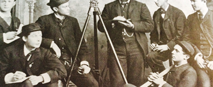 historical black and white photo of men with instruments