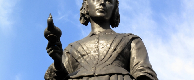 photo of statue with sky background