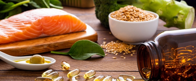 photo of vitamins, salmon steak, broccoli, spinach