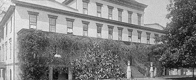 historical black and white photo of a large building