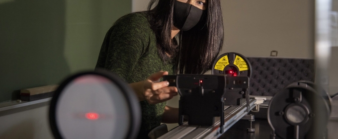photo of woman with laser