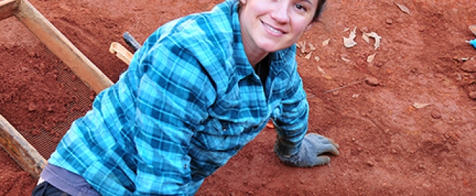 woman on archeological dig