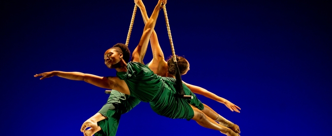 photo of two aerial dancers in performance