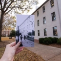 photo of buildings with ahead holding old snapshot of view