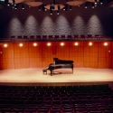 Piano sitting on a stage