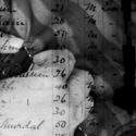 video still of hans sewing in black and white, with text